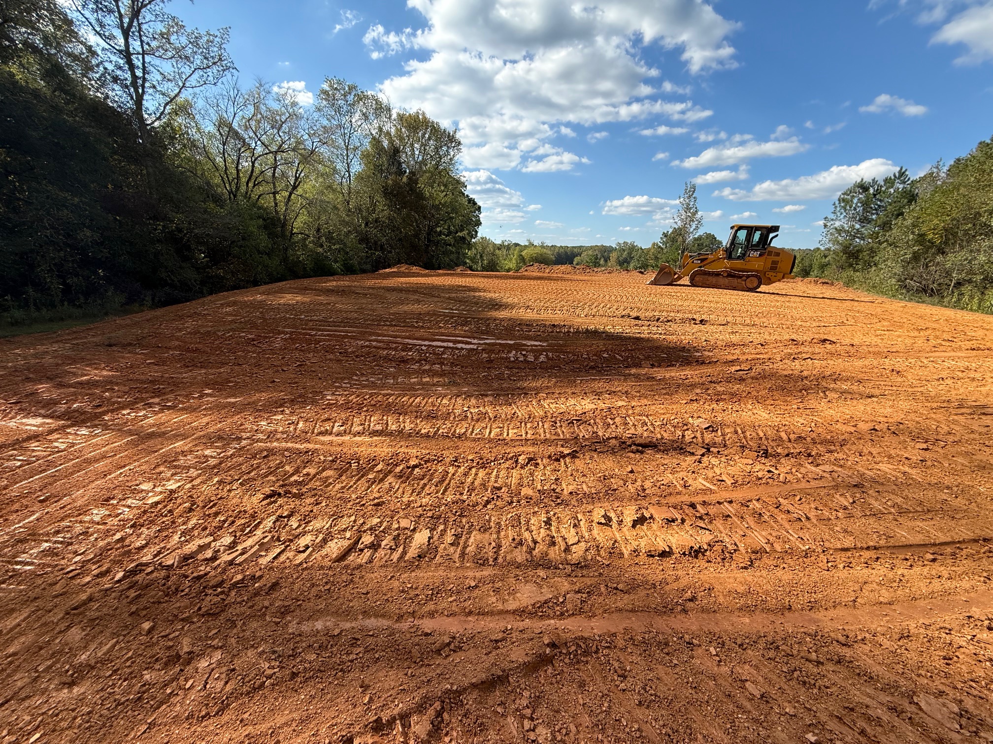 grading crew shaping a homesite